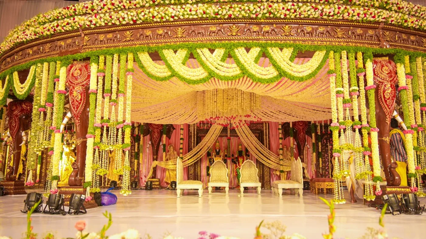 Floral wedding mandap and reception stage design